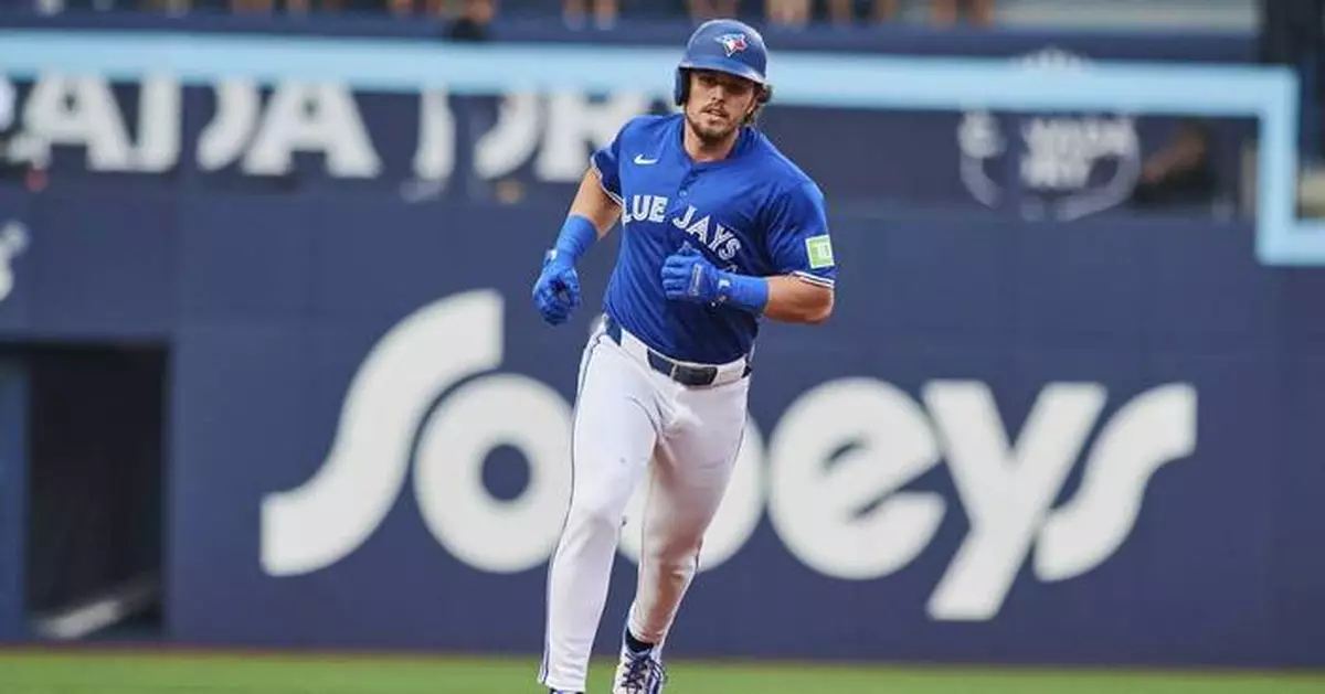 Blue Jays waste 8-run lead, then outlast Yankees 11-9 to tie New York for AL East lead