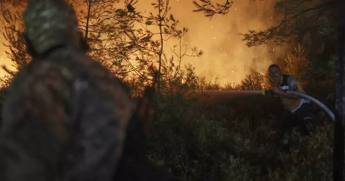 UN teams deploy to Syrian coast as wildfires force hundreds to flee