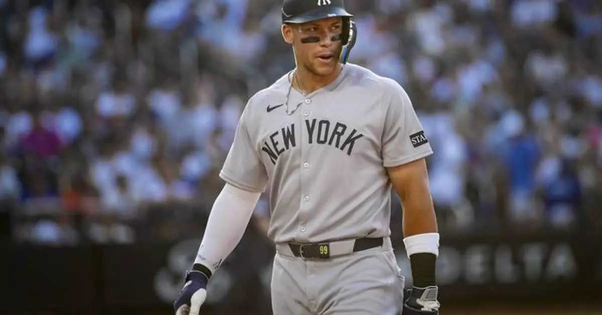 Aaron Judge gets struck in the face by a toss from Yankees teammate Anthony Volpe