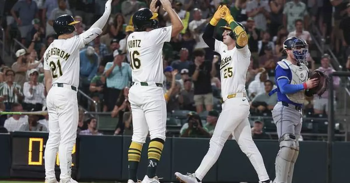 Rooker hits 2-run HR, Miller strikes out 2 with runner on 2nd in 9th as Athletics beat Blue Jays 4-3
