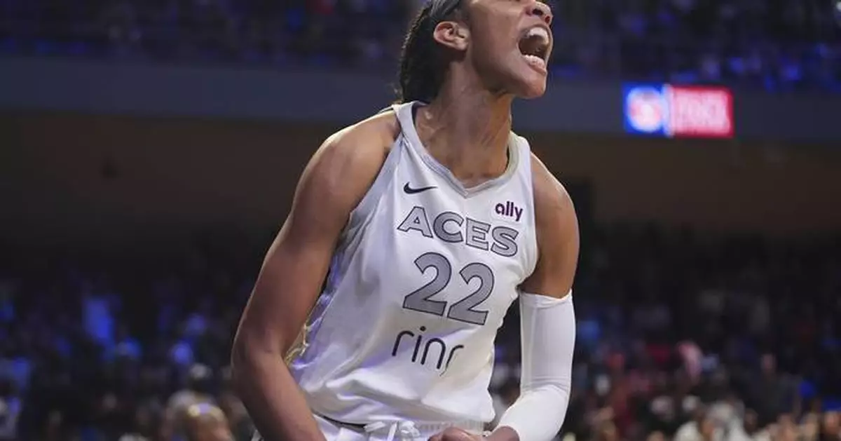 A’ja Wilson scores a season-high 37 and Las Vegas holds off a late rally to beat the Wings 90-86