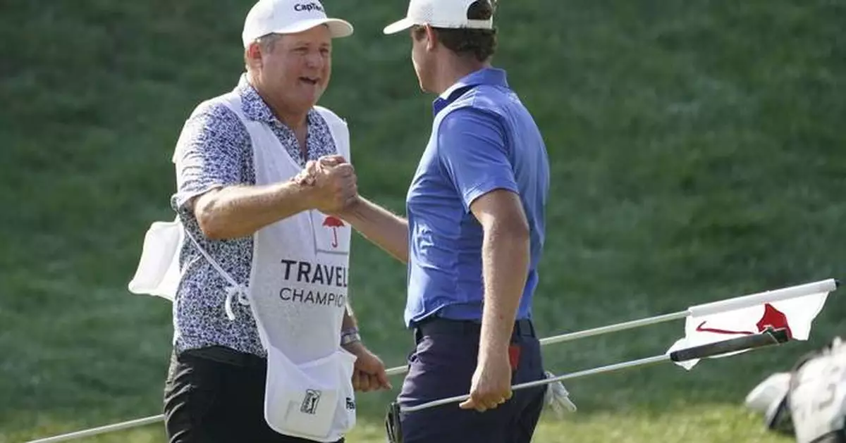 Harris English without his caddie who is waiting on visa approval over past drug conviction