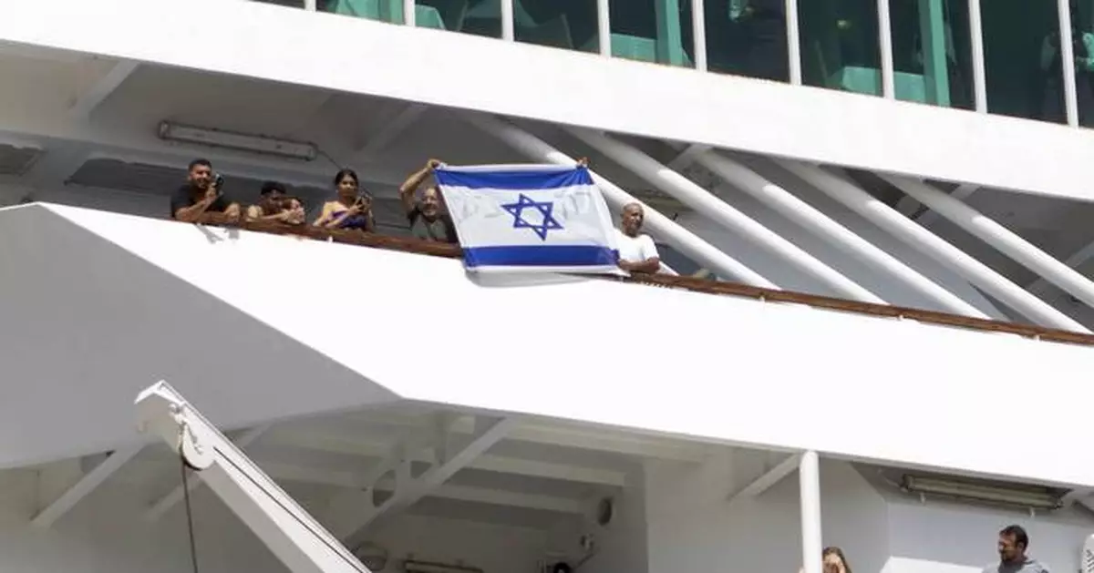 Anti-war demonstrators protest the arrival of an Israeli cruise ship on the Greek island of Crete