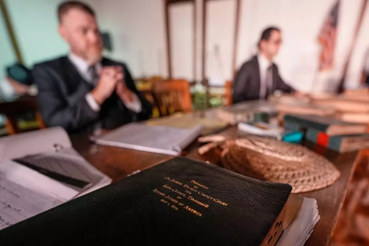 A Bible is placed on the set during a rehearsal for the play "Destiny in Dayton", July 8, 2025, in Dayton, Tenn. (AP Photo/Mike Stewart)