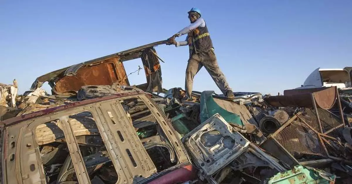 Zimbabwe's scrap metal hunters are quietly fighting climate change one piece at a time