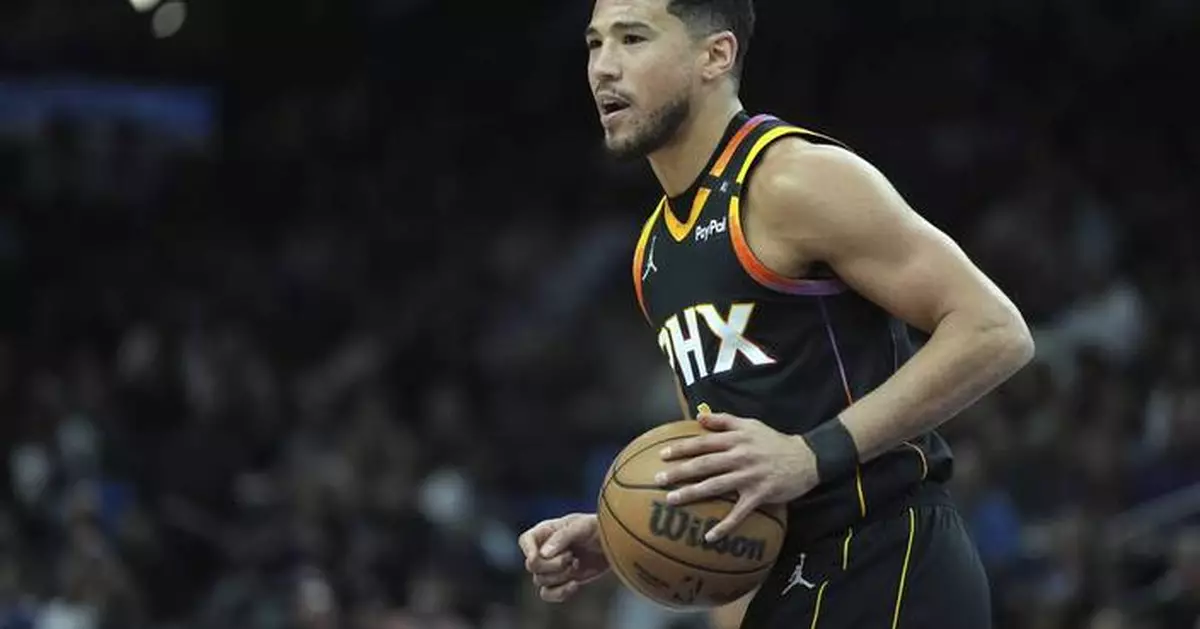 Suns sign Devin Booker to 2-year, $145 million max extension through 2029-30, AP sources say
