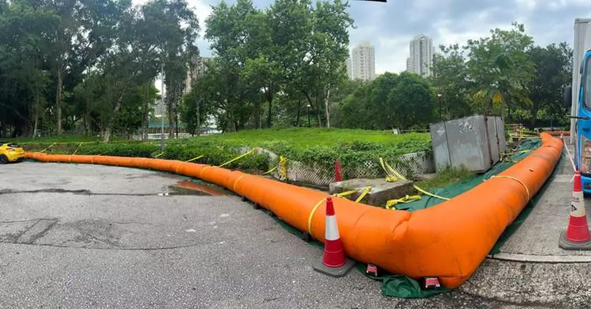 Tai Po Kau Prepares for Flooding with Barriers and Pumps Amid Severe Tropical Storm Wipha Approach.