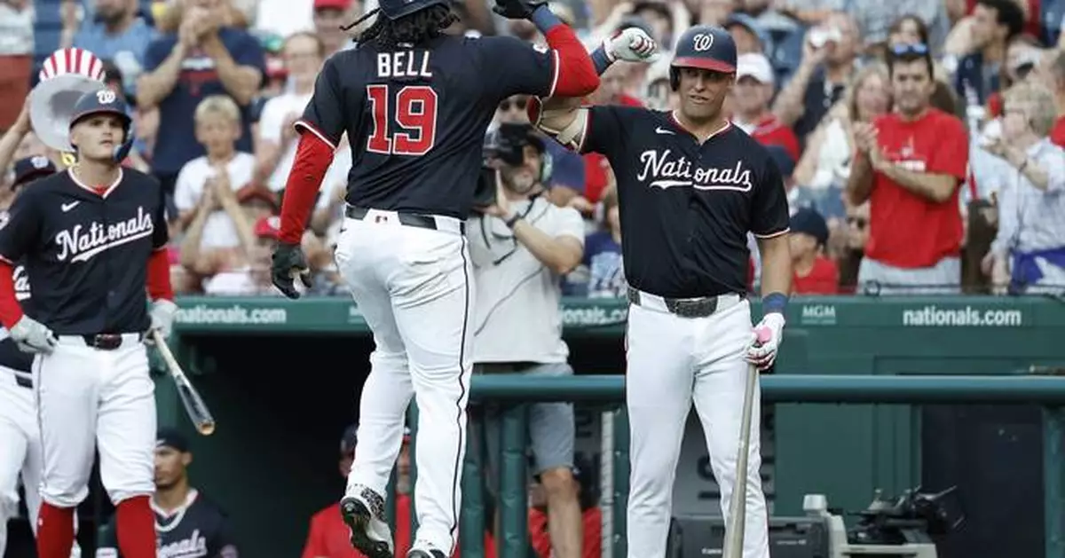 Josh Bell and Daylen Lile lead Nationals in 10-8 win over Reds
