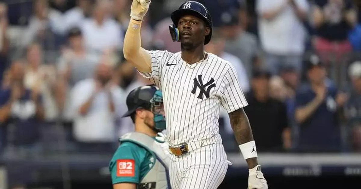 Chisholm homers twice and Schlittler wins MLB debut as Yankees top Mariners 9-6