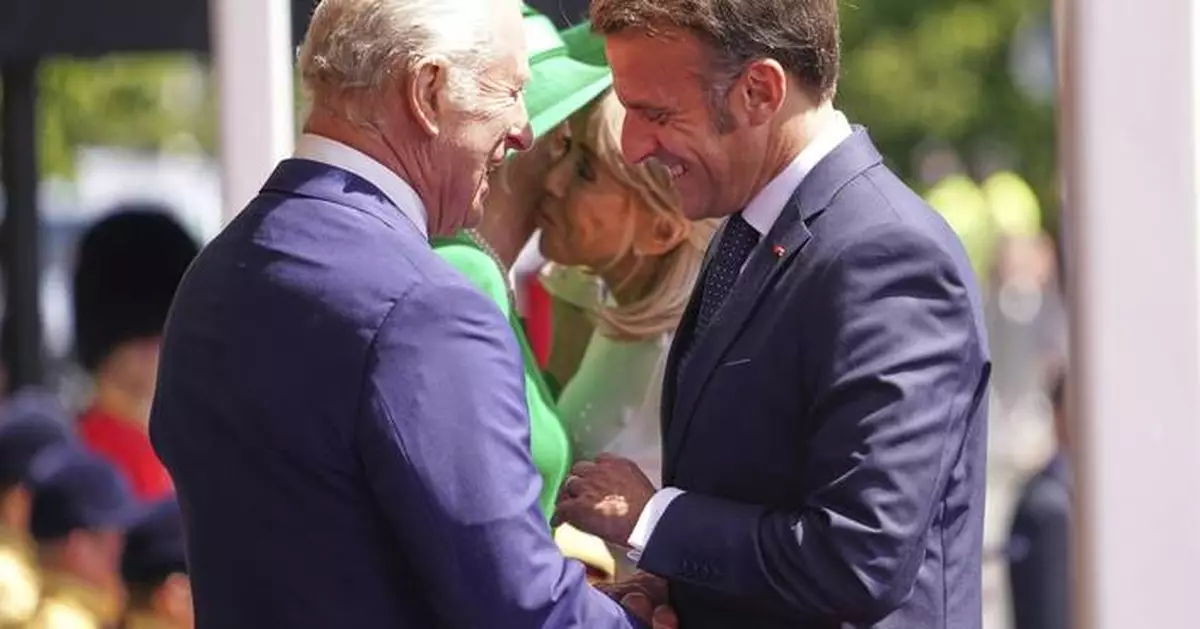 Photos show French President Emmanuel Macron's UK state visit