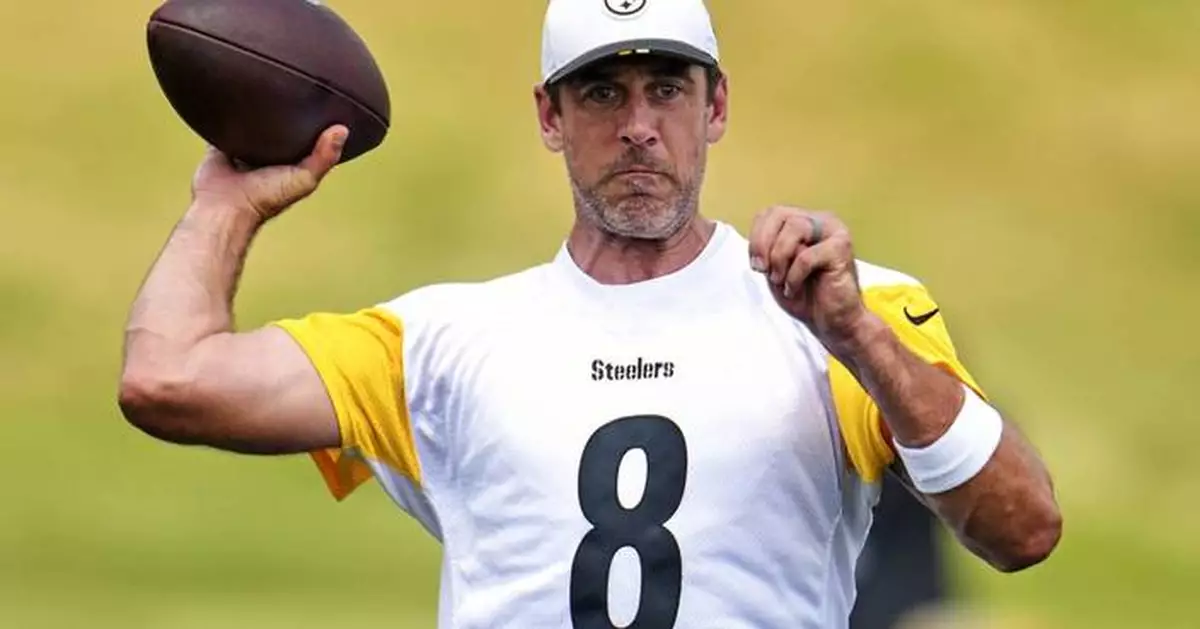 Aaron Rodgers' first training camp in Pittsburgh starts with a meaningless pick and careful optimism