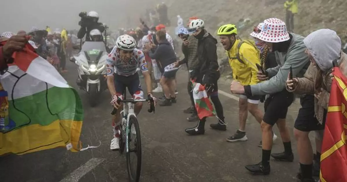 Ineos-Grenadiers team car hits spectator during Tour de France