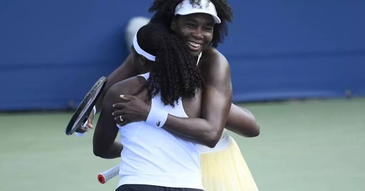 Venus Williams wins a doubles match at Washington in her first tournament in more than a year