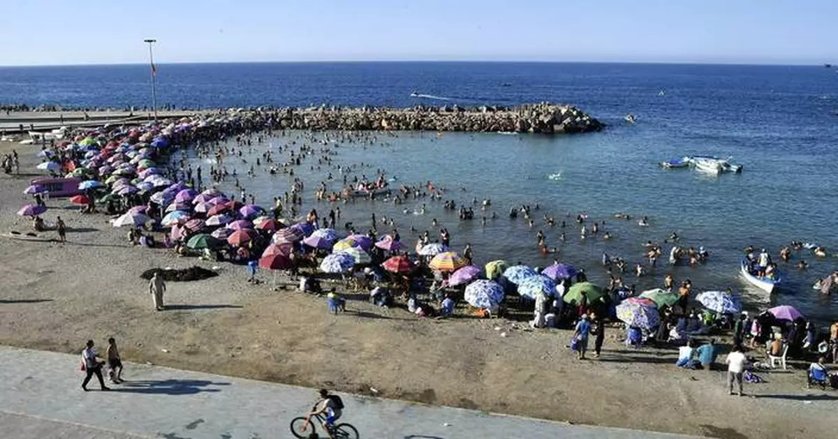 Bermuda shorts, beachwear and a local ban divide Algerian town