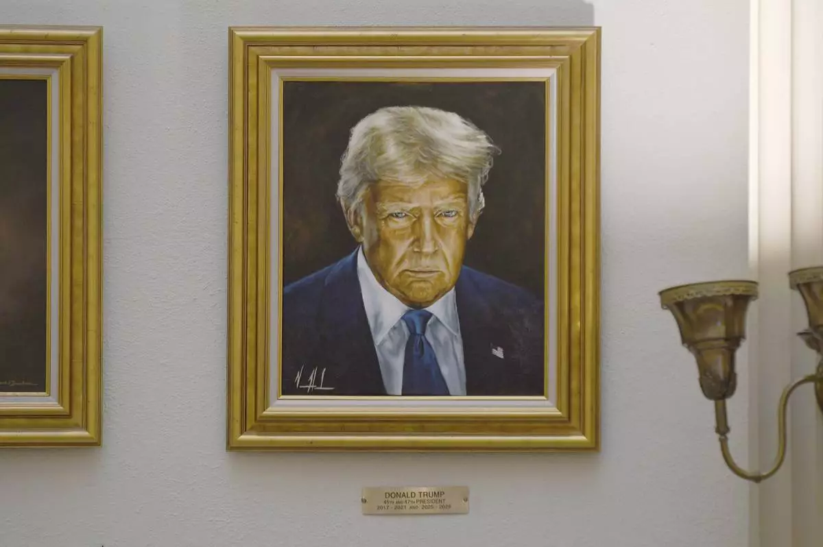 A portrait of President Donald Trump hangs in the Colorado State Capitol in Denver on Tuesday, July 1, 2025. (AP Photo/Thomas Peipert)