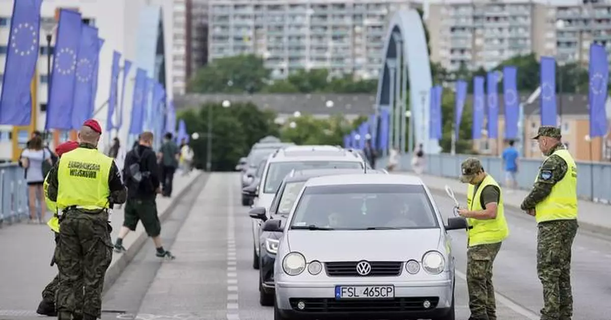 Poland reinstates border controls with Germany and Lithuania to discourage asylum-seekers