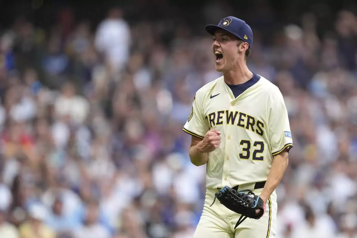 Milwaukee Brewers' Jacob Misiorowski reacts after striking out Los Angeles Dodgers' Freddie Freeman during the third inning of a baseball game Tuesday, July 8, 2025, in Milwaukee. (AP Photo/Aaron Gash)