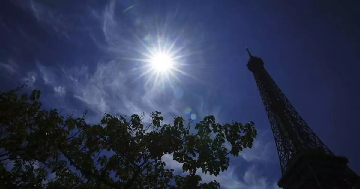 Europe sizzles and the Eiffel Tower's summit closes