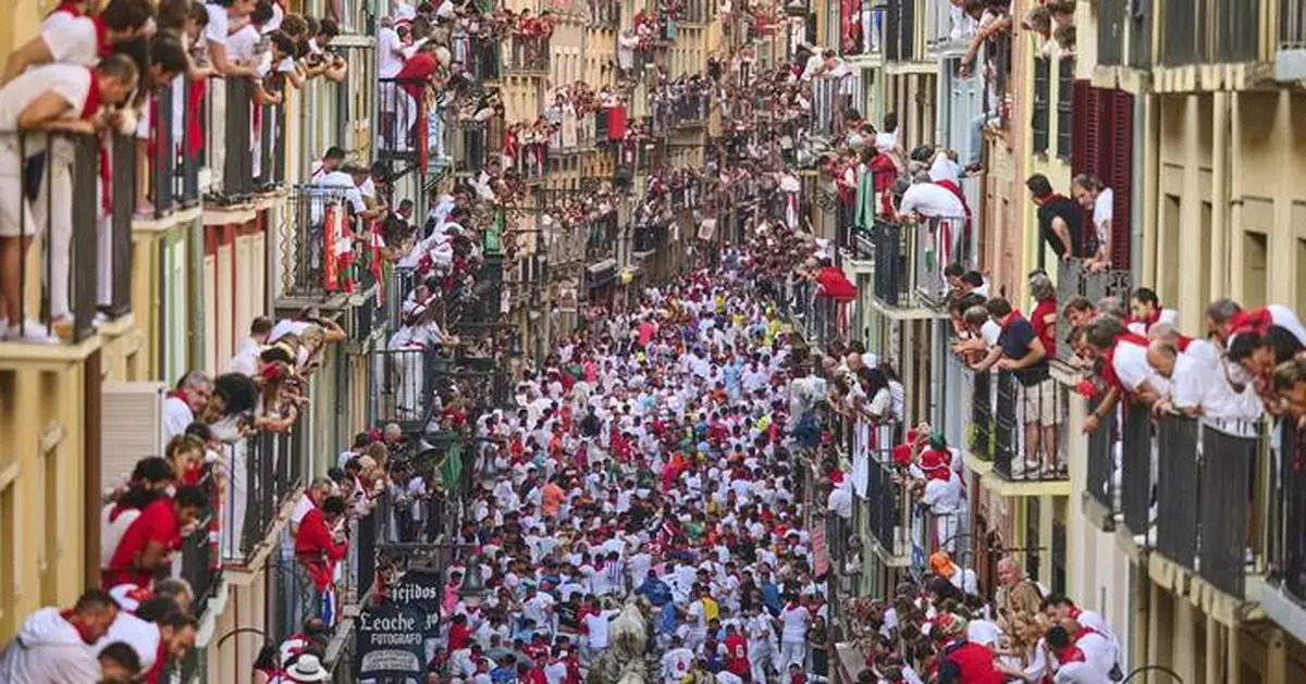 Top photos of thrilling moments and close calls at Spain's San Fermín bull-running festival