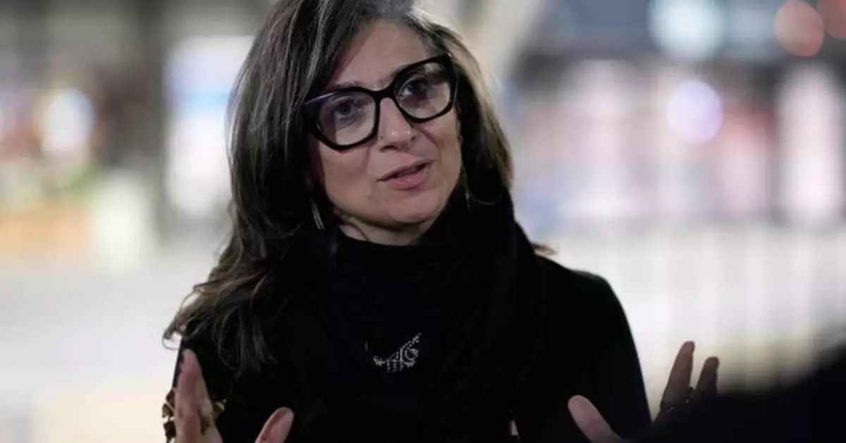 UN investigator and critic of Israel's actions in Gaza tells AP she was shocked by US sanctions