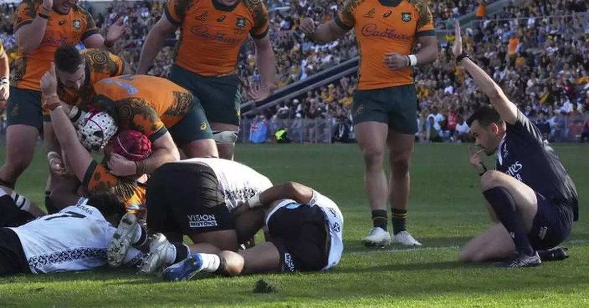 Harry Wilson's late try saves Australia in a 21-18 win over Fiji