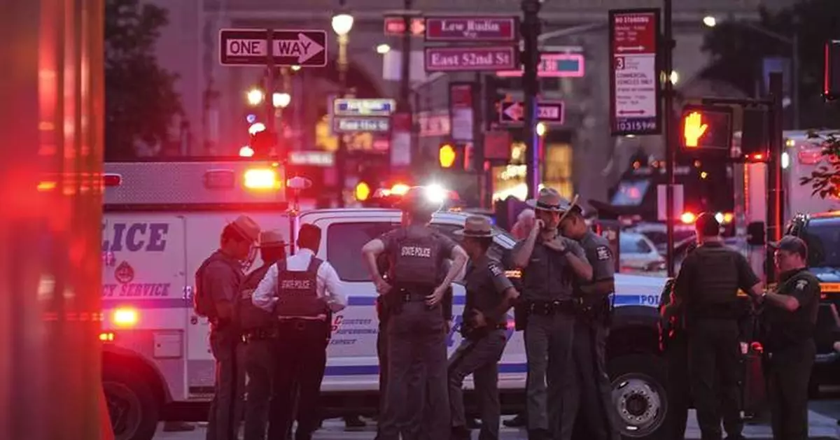 A shooting at a midtown Manhattan office building, in photos