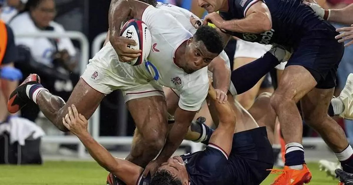 England dominates US in lightning-delayed rugby match