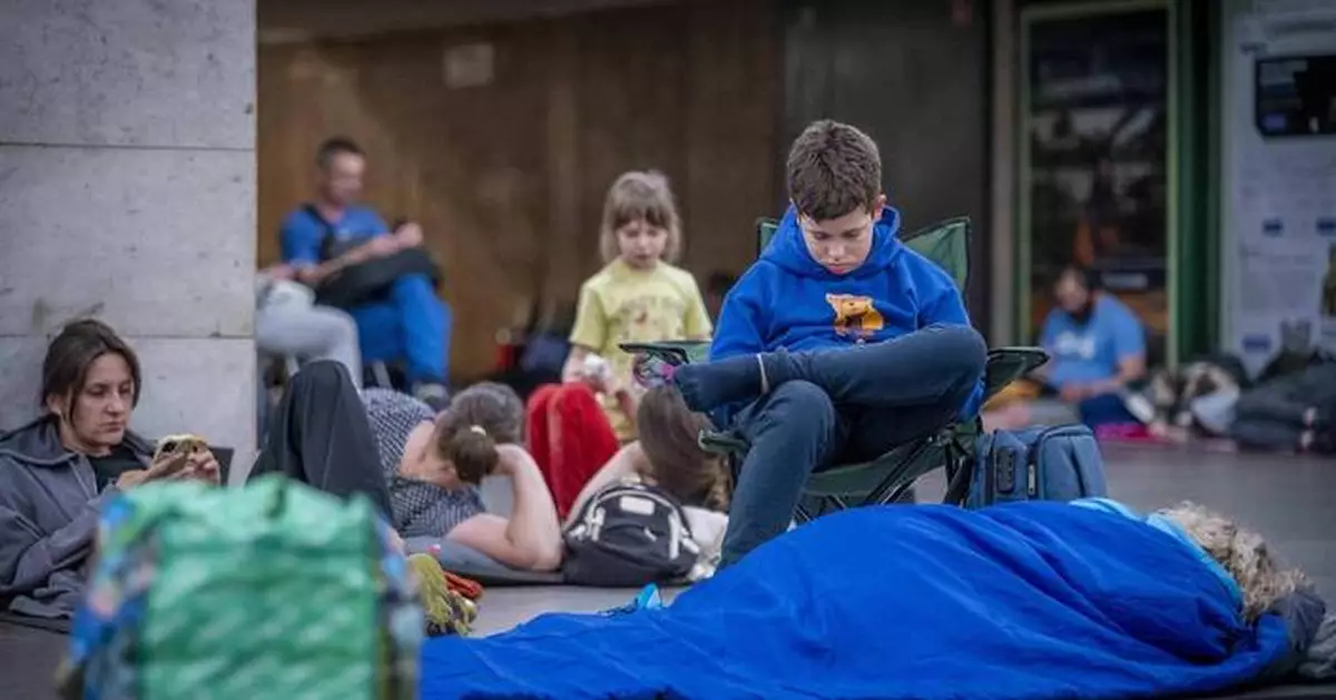 Ukraine says it struck a Russian air base as Russia sent hundreds of drones into Ukraine