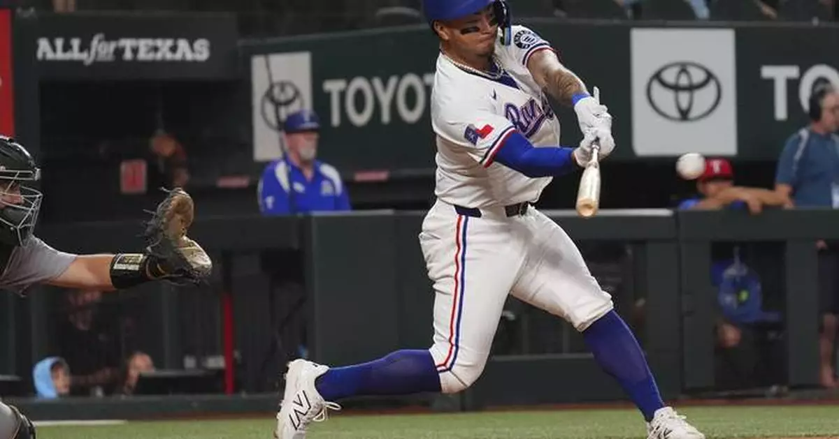 Freeman and Helman get big-league 1sts on back-to-back pitches for Rangers against A's