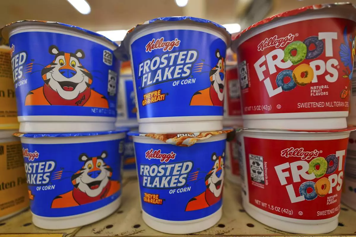 Kellogg's cereal products are shown at a grocery store in Richardson, Texas, Friday, July 11, 2025. (AP Photo/LM Otero)