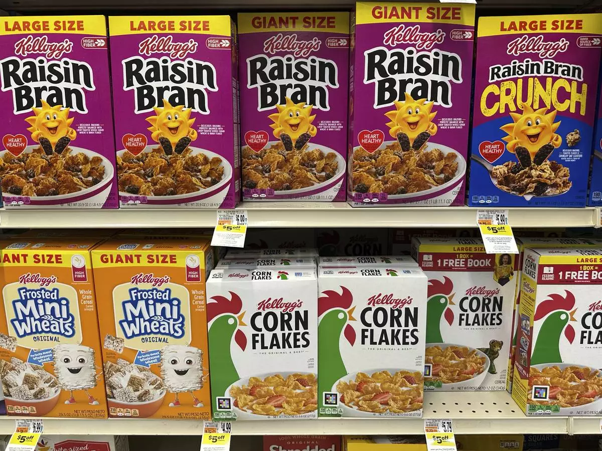 Boxes of Kellogg's breakfast cereal are seen at a super market, Friday, July 11, 2025, in Springfield, Pa. (AP Photo/Matt Slocum)
