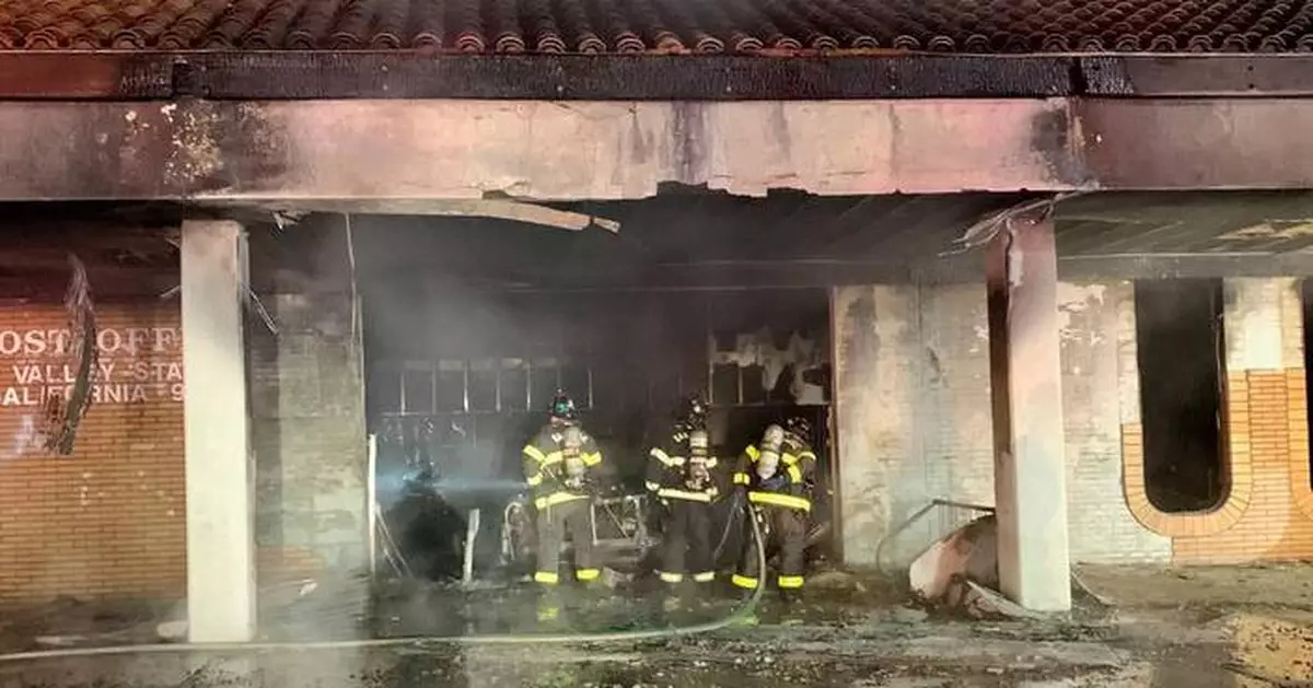 Suspect arrested after car crashes into post office and catches fire in San Jose, California