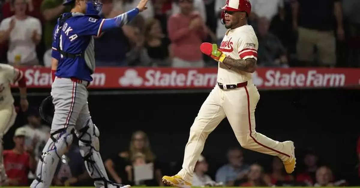 Moncada's clutch hit highlights 4-run rally that lifts Angels over Rangers 8-5