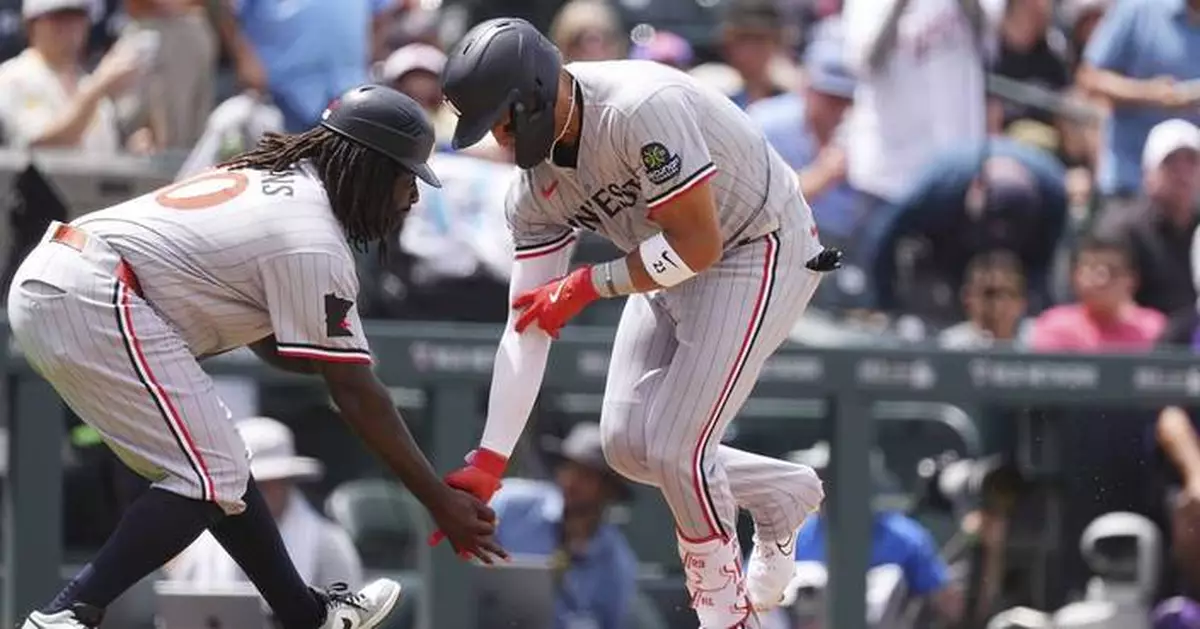Lewis hits 2 homers and Ryan strikes out 11 as Twins top Rockies to avert series sweep