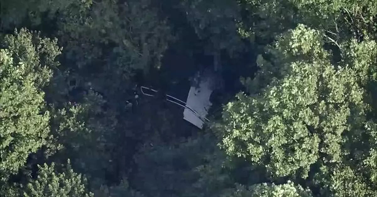New Jersey skydiving company says pilot tried emergency landing but plane went off runway into woods