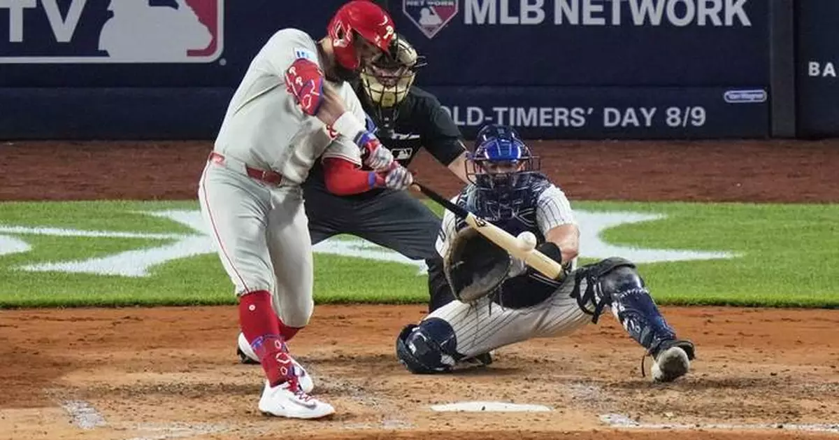 Schwarber, Realmuto power Phillies to 12-5 win, dropping Yankees 5 1/2 games back of Blue Jays