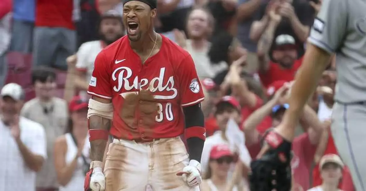 Benson triples and scores on 9th-inning error to left the Reds past the Rockies, 4-3