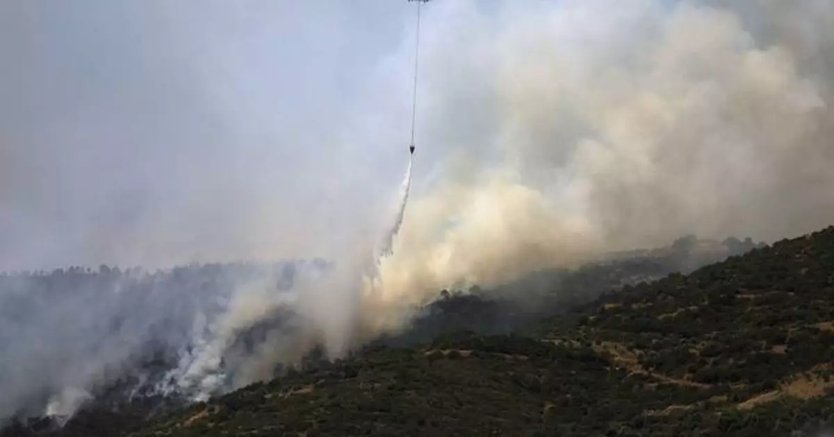 Turkey sends firefighting aircraft to Syria as wildfires rage on both sides of the border