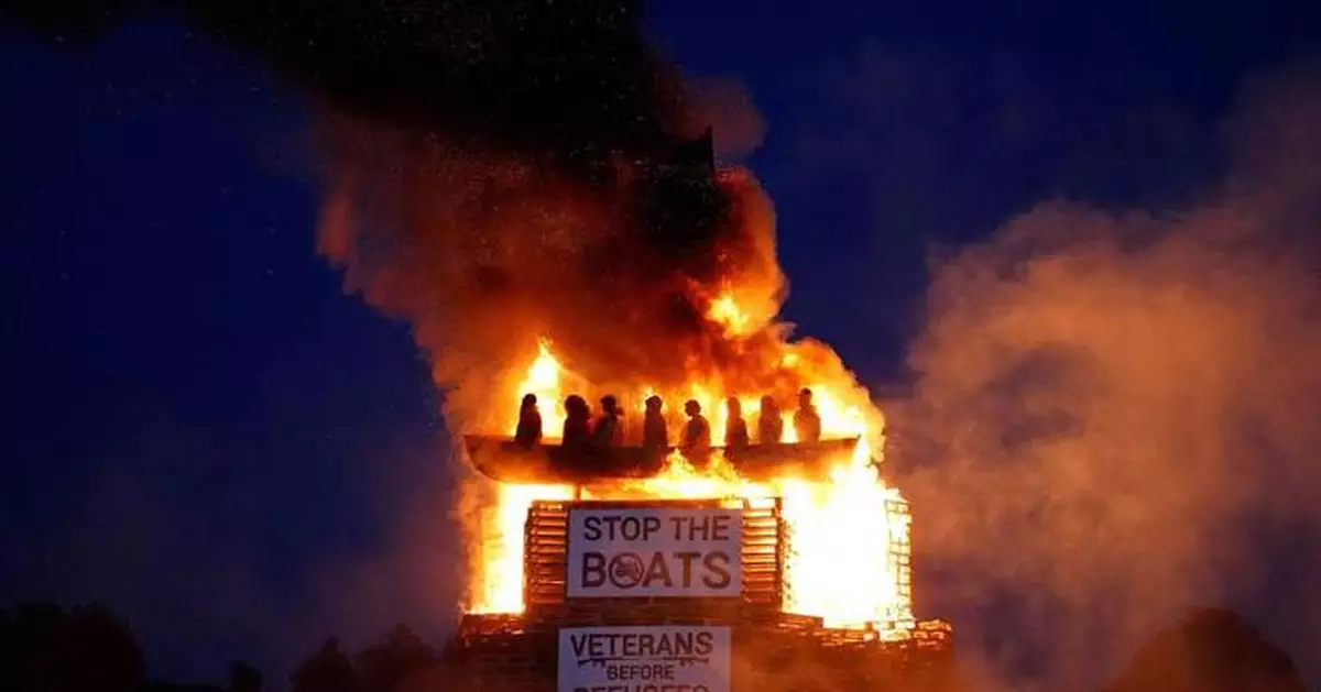 Burning of migrant boat effigy in Northern Ireland triggers police investigation
