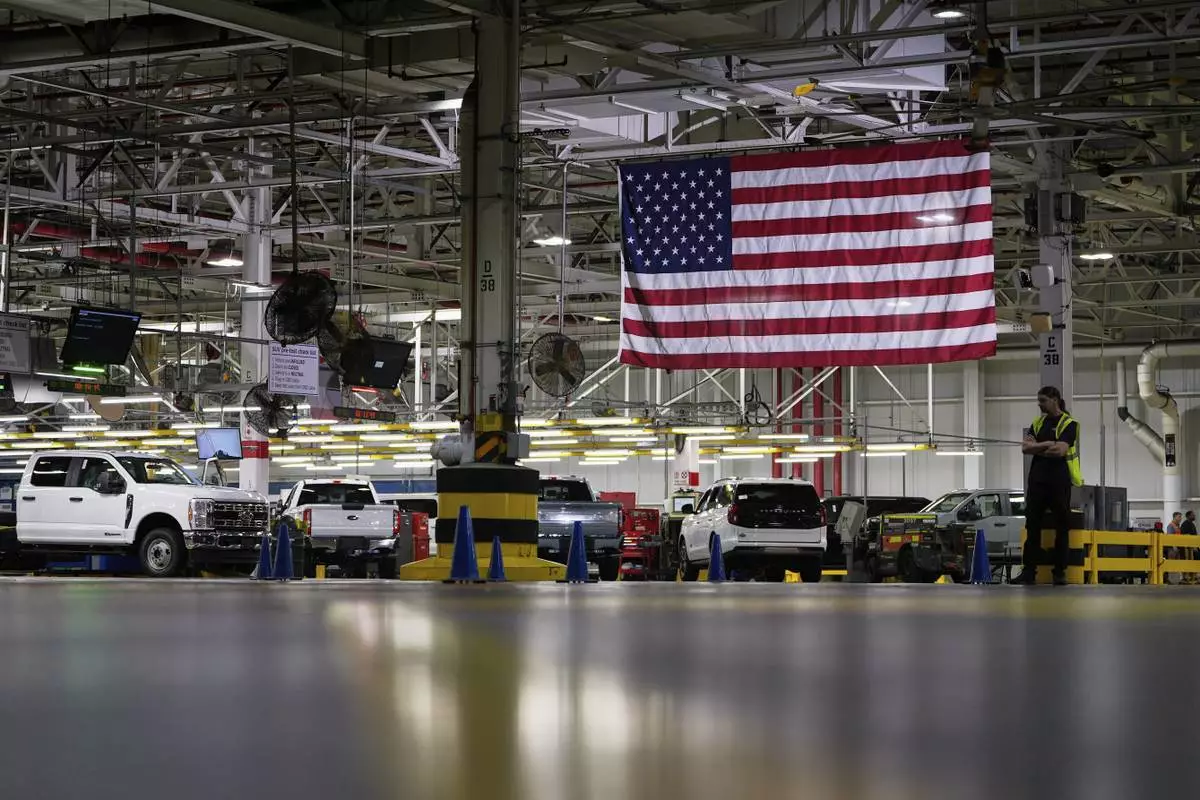 An American Flag at the Ford Motor Company Kentucky Truck Plant is seen during a media tour for the launch of the 2025 Ford Expedition in Louisville, Ky., April 30, 2025. (AP Photo/Carolyn Kaster, File)