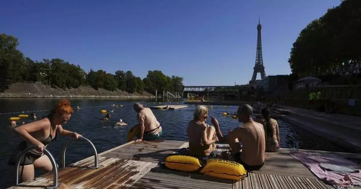 The Seine in Paris is open for swimming. Tourists and residents embrace it as temperatures soar