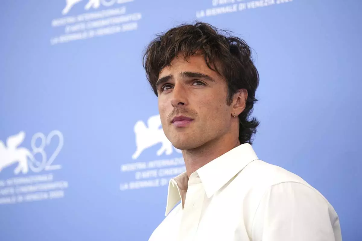 Jacob Elordi poses for photographers at the photo call for the film 'Frankenstein' during the 82nd edition of the Venice Film Festival in Venice, Italy, on Saturday, Aug. 30, 2025. (Photo by Alessandra Tarantino/Invision/AP)