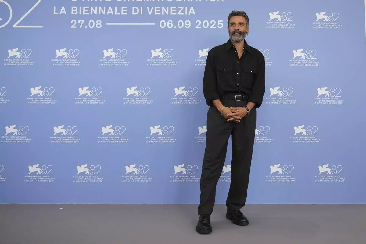 Oscar Isaac poses for photographers at the photo call for the film 'Frankenstein' during the 82nd edition of the Venice Film Festival in Venice, Italy, on Saturday, Aug. 30, 2025. (Photo by Alessandra Tarantino/Invision/AP)