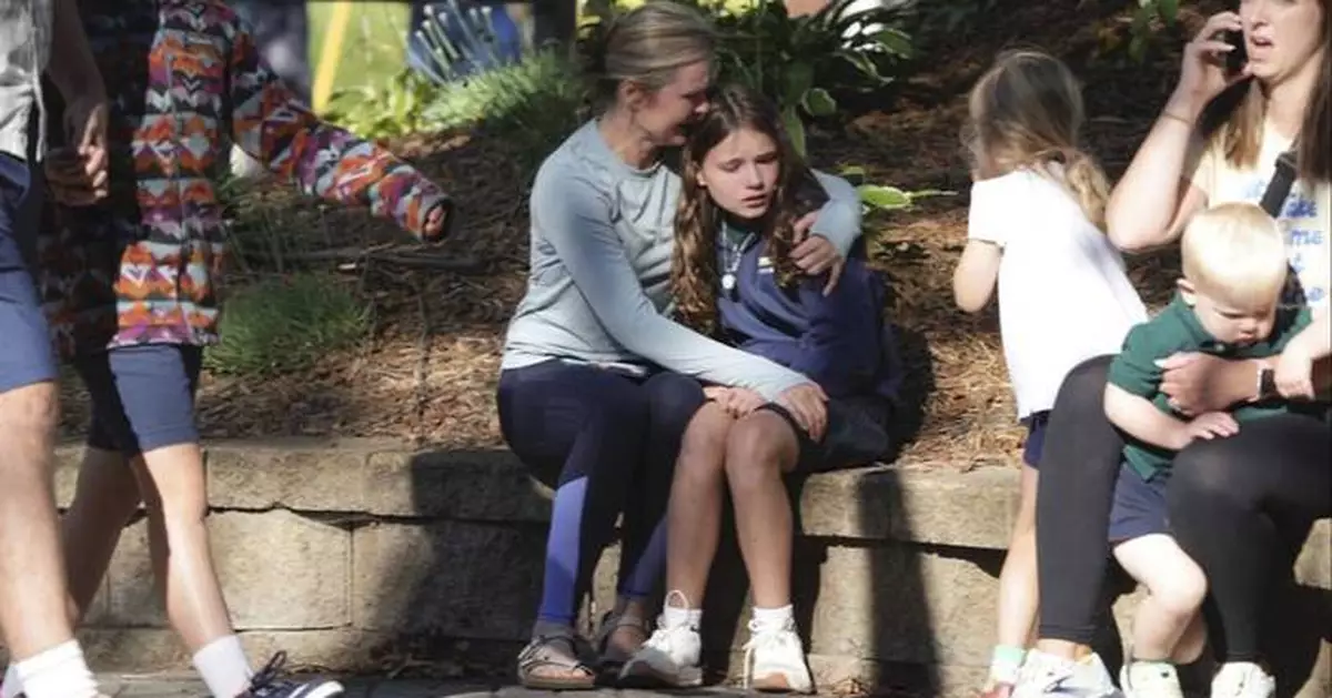 The Latest: All 14 injured kids expected to survive after shooting at Minneapolis Catholic school