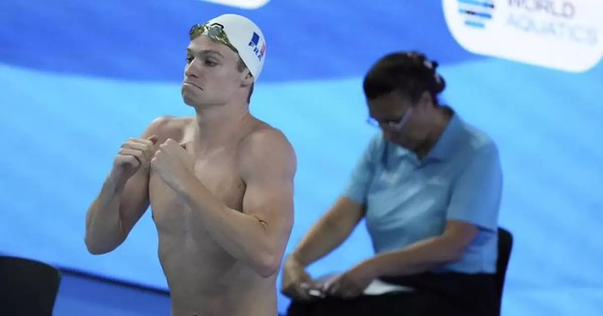 Americans finish strong with a relay world record in the swim worlds to top medal tables