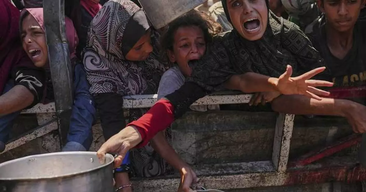 Photos show Palestinians struggling for food as famine grips Gaza's largest city