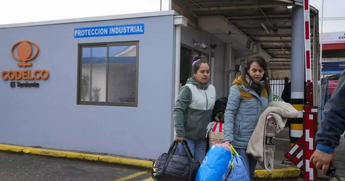 Rescue workers in Chile find the body of one of 5 miners trapped in a copper mine
