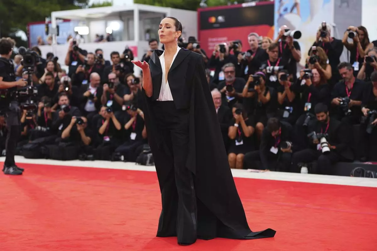 Noomi Rapace poses for photographers on the red carpet for the film 'Bugonia' during the 82nd edition of the Venice Film Festival in Venice, Italy, on Thursday, Aug. 28, 2025. (Photo by Scott A Garfitt/Invision/AP)