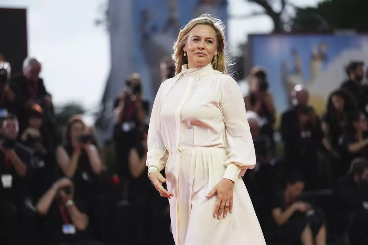 Alicia Silverstone poses for photographers on the red carpet for the film 'Bugonia' during the 82nd edition of the Venice Film Festival in Venice, Italy, on Thursday, Aug. 28, 2025. (Photo by Scott A Garfitt/Invision/AP)
