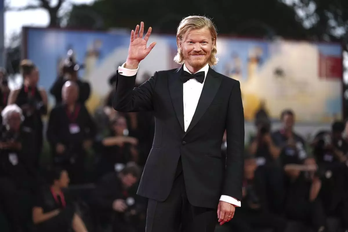 Jesse Plemons poses for photographers on the red carpet for the film 'Bugonia' during the 82nd edition of the Venice Film Festival in Venice, Italy, on Thursday, Aug. 28, 2025. (Photo by Scott A Garfitt/Invision/AP)